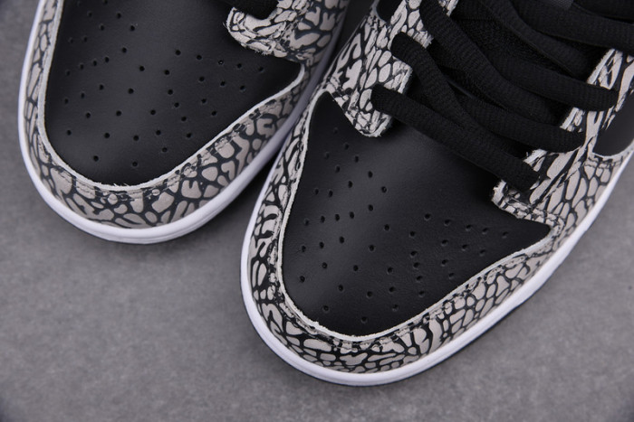 nike dunk sb low s*upre*me black cement 304292-131